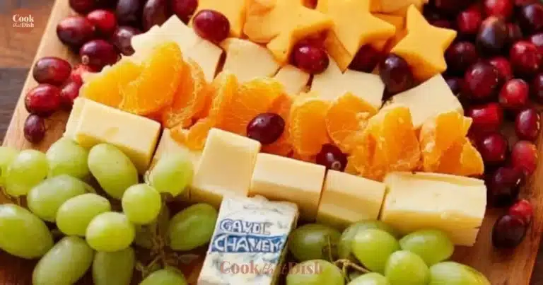 Christmas tree shaped charcuterie board filled with seasonal treats and cheeses
