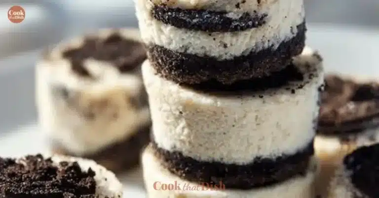 Oreo Cheesecake Bites on a plate with chocolate drizzle