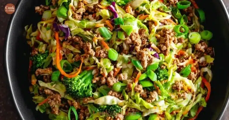High protein egg roll bowl with vegetables and meat in a colorful dish