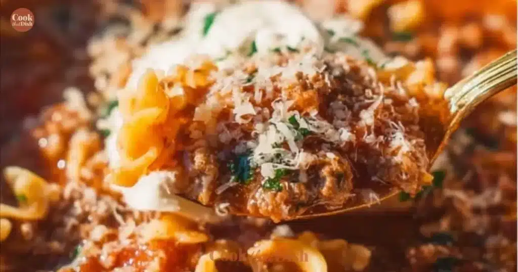 Bowl of high protein lasagna soup garnished with herbs and cheese