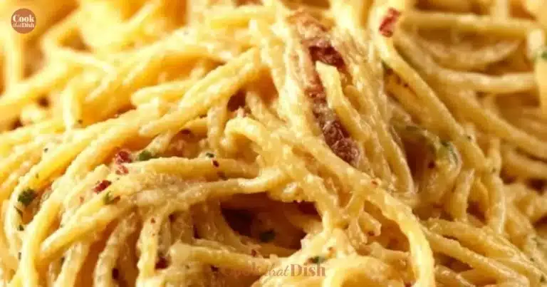 Plate of Marry Me Pasta topped with fresh herbs and parmesan cheese