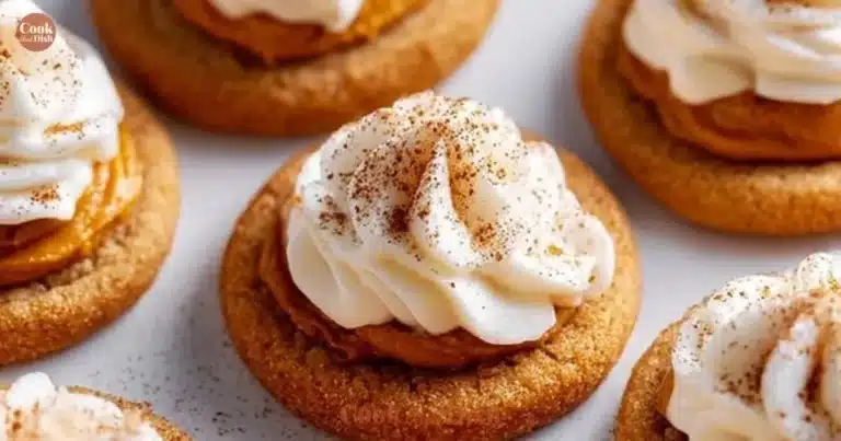 Soft pumpkin pie cookies fresh out of the oven with spices and frosting