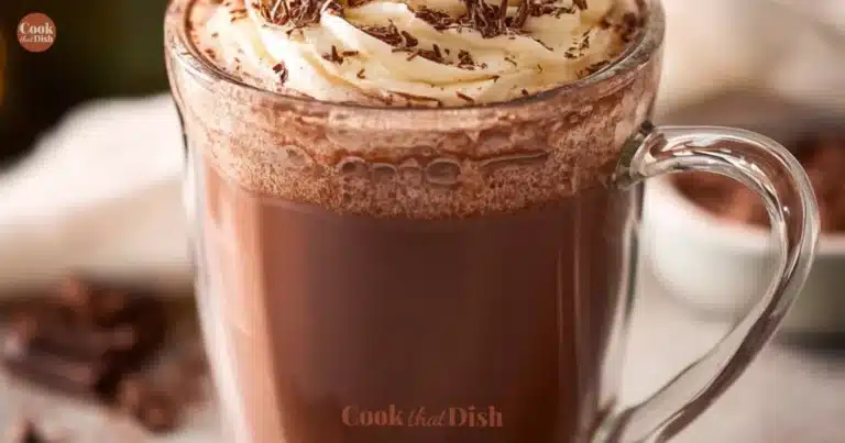 Home homemade recipes A steaming mug of collagen hot chocolate topped with whipped cream and cocoa powder